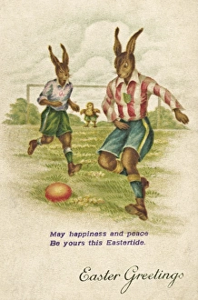 Rabbits playing football on an Easter postcard Rabbits playing football on an Easter postcard