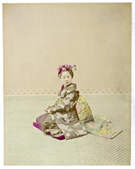 <b class=qtipBold><figcaption>Racial/Japan/Girl/Geisha</figcaption></b><br>A girl (possibly an apprentice geisha) sitting in an elaborate and heavy kimono.<br><em>© Mary Evans Picture Library</em> Racial/Japan/Girl/Geisha