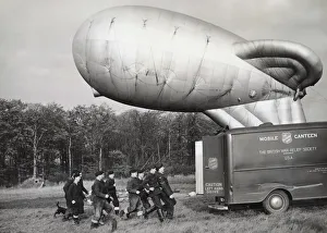 An RAF Barrage-Balloon Section of Soldiers Running for t? An RAF Barrage-Balloon Section of Soldiers Running for t?