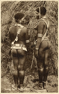 Rear view of two young Zulu Women, South Africa Rear view of two young Zulu Women, South Africa