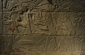 Relief depicting a butchering scene. Egypt Relief depicting a butchering scene. Egypt