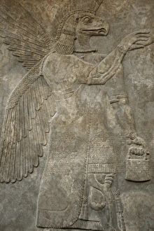 Relief depicting a eagle-headed protective spirit. Nimrud Relief depicting a eagle-headed protective spirit. Nimrud