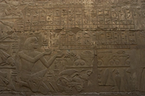 Relief depicting a pharaoh making an offering to the Gods Relief depicting a pharaoh making an offering to the Gods