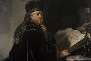 Rembrandt van Rijn (1606-1669). A Scholar in his study or A Rembrandt van Rijn (1606-1669). A Scholar in his study or A
