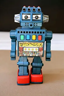 Robotic Gallery: Retro Toy Walking Plastic Robot - Blue-Grey Metallic Body