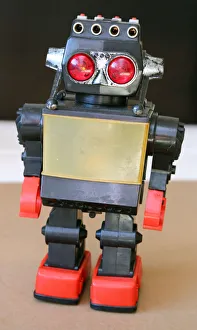 Robotic Gallery: Retro Toy Walking Plastic Robot - Grey Body (1 / 2)