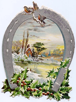 Robins and horseshoe on a Christmas card Robins and horseshoe on a Christmas card