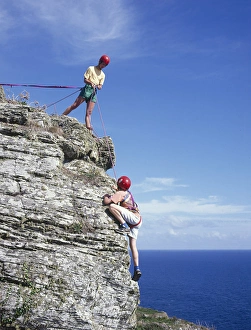 Rock climbing near Porthcurno, Cornwall Rock climbing near Porthcurno, Cornwall