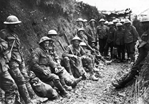 <b class=qtipBold><figcaption>Royal Irish Rifles 1916</figcaption></b><br>British troops - a party of the Royal Irish Rifles - rest in a communication trench on the first day of the Battle of the Somme.<br><em>© Mary Evans/Robert Hunt Collection</em> Royal Irish Rifles 1916