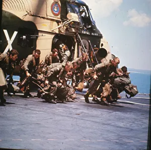 Helicopter Gallery: Royal Marine Commandos re-embarking from a Westland Wessex