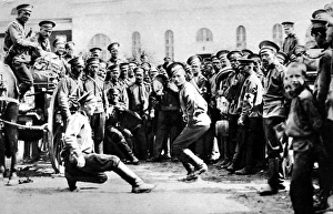 Russian soldiers celebrating good news from the front with dance and music Russian soldiers celebrating good news from the front with dance and music
