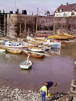 Idyllic Gallery: Scene with boats at Porlock Weir, Somerset