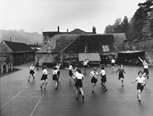<b class=qtipBold><figcaption>School Netball Match</figcaption></b><br>A netball game in progress at a school.<br><em>© Mary Evans Picture Library/HENRY GRANT</em> School Netball Match