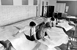 Scientists examining maps and statistics at the Anti-Locust Research Centre (ALRC) Scientists examining maps and statistics at the Anti-Locust Research Centre (ALRC)