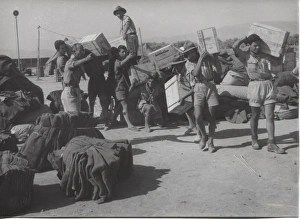 Scouts unloading supplies after earthquake, Greece Scouts unloading supplies after earthquake, Greece