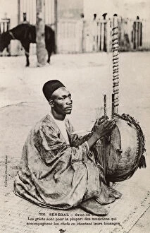 Stringed Gallery: Senegal - Griot playing a Kora