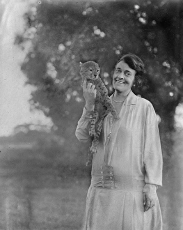 Settler with cheetah cub, Nakuru, East Africa Settler with cheetah cub, Nakuru, East Africa