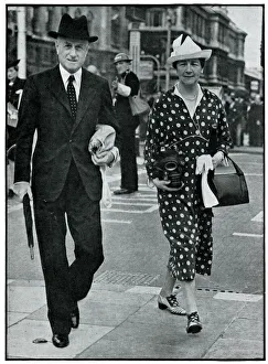 Sir Hoare and his wife carrying gas masks, September 1939 Sir Hoare and his wife carrying gas masks, September 1939