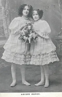<b class=qtipBold><figcaption>Sisters Marion music hall vocalists</figcaption></b><br>The Sisters Marion harmonising duettists. Described as a juvenile act. Fashionable in the music hall for young women to dress as children. Wearing matching knee-length white dresses and flat shoes. The shorter of the two is wearing white socks. Sister acts were not always real sisters. Date: circa 1907<br><em>© MonoMania Images / Mary Evans Picture Library</em> Sisters Marion music hall vocalists