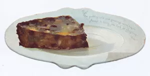 Slice of pudding on a plate on a shaped Christmas card