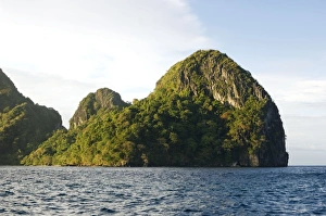Small rocky volcanic island near El Nido Small rocky volcanic island near El Nido