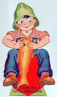 Smiling boy with large fish on a Valentine card Smiling boy with large fish on a Valentine card