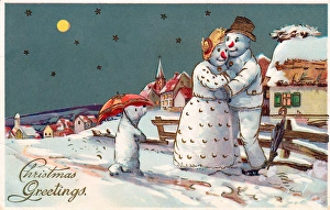 Snowman and snow woman on a Christmas postcard Snowman and snow woman on a Christmas postcard