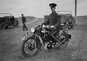 Soldier on a motorbike near Okehampton, Devon Soldier on a motorbike near Okehampton, Devon