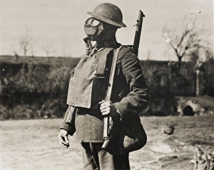 <b class=qtipBold><figcaption>Soldier wearing gas mask, 1918</figcaption></b><br>British soldier wearing a gas mask and helmet on the Western Front in France during World War I in 1918.<br><em>© Mary Evans/Robert Hunt Collection</em> Soldier wearing gas mask, 1918