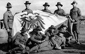 Soldiers from the New Zealand Expeditionary Force posed with the captured Imperial German Standard Soldiers from the New Zealand Expeditionary Force posed with the captured Imperial German Standard