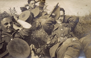 Soldiers of Royal Fusiliers relaxing during route march, WW1 Soldiers of Royal Fusiliers relaxing during route march, WW1