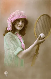 Sporty French Tennis Girl prepares to serve Sporty French Tennis Girl prepares to serve