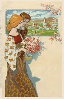 Springtime - a young German couple with a picture of a small rural town in the background Springtime - a young German couple with a picture of a small rural town in the background