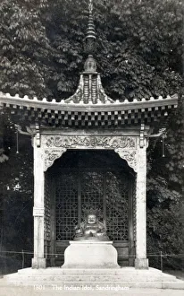 Statue of the Buddhist divinity Kuveraa in the grounds of Sandringham, Norfolk Statue of the Buddhist divinity Kuveraa in the grounds of Sandringham, Norfolk