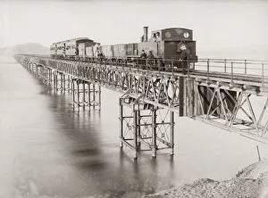 Steam train, locomotive, steel bridge, South America Steam train, locomotive, steel bridge, South America
