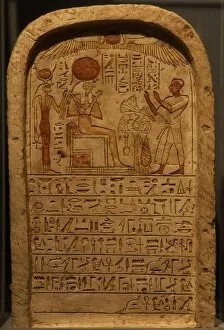 Images Dated 25th November 2003: Stele depicting a priest making an offering to the god Ra. E