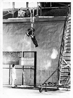 Thai paratroop trainee practising rapelling Thai paratroop trainee practising rapelling