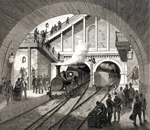 <b class=qtipBold><figcaption>Thames Railway Tunnel</figcaption></b><br>One train emerges from the railway tunnel beneath the Thames into the station at Wapping while another train plunges into it<br><em>© Mary Evans Picture Library</em> Thames Railway Tunnel