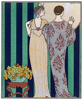<b class=qtipBold><figcaption>Theatre Robe & Coat 1913</figcaption></b><br>High-waisted clinging gown: finely pleated & ornamented with geometric designs, short tunic with a 'V'-neck trimmed with pearls; voluminous coat in a bold floral print.<br><em>© Mary Evans Picture Library</em> Theatre Robe & Coat 1913