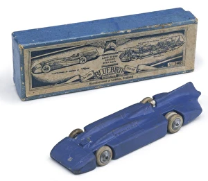 <b class=qtipBold><figcaption>Tin Model of a Bluebird</figcaption></b><br>The Bluebird in which Sir Malcolm Campbell set a new land speed record of 301.129 mph at the Bonneville Salt Flats, Utah on 3rd September 1935<br><em>© Mary Evans Picture Library 2015 - https://copyrighthub.org/s0/hub1/creation/maryevans/MaryEvansPictureID/10232137</em> Tin Model of a Bluebird