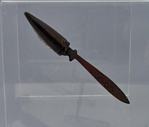 A tiny letter opener beaten from a copper bullet A tiny letter opener beaten from a copper bullet