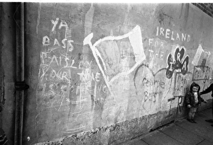 Toddler with IRA graffiti, Belfast, Northern Ireland Toddler with IRA graffiti, Belfast, Northern Ireland