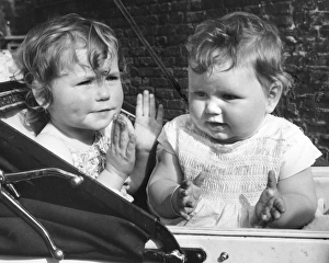 Clapping Gallery: Two toddlers in a pram