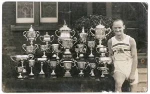 Tommy Green with 24 trophies, 1932 Olympics Tommy Green with 24 trophies, 1932 Olympics