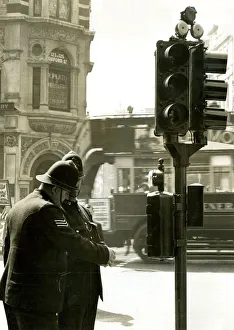 Traffic lights with bells on top, Oxford Street, London Traffic lights with bells on top, Oxford Street, London
