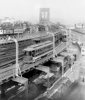 Train on the elevated railway approach to Brooklyn Bridge, B Train on the elevated railway approach to Brooklyn Bridge, B