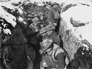 <b class=qtipBold><figcaption>In the trenches 1917</figcaption></b><br>Soldiers of the 6th Queen's (Royal West Surrey) Regiment eating dinner in the trenches at the Battle of Arras on the Western Front in France during World War I in March 1917<br><em>© Mary Evans/Robert Hunt Collection</em> In the trenches 1917