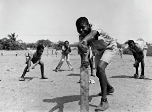 <b class=qtipBold><figcaption>Trenchtown School, Jamaica</figcaption></b><br>Trenchtown Comprehensive School, Kingston, Jamaica, boys playing cricket, 1965 Date: 1965<br><em>© Mary Evans / National Archives</em> Trenchtown School, Jamaica