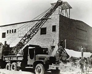 Truck Clearing the Rubble Soon after the End of World Wa? Truck Clearing the Rubble Soon after the End of World Wa?
