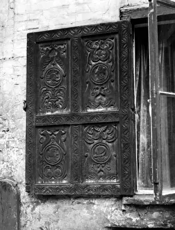 Prints of One of the elaborately carved shutters on the house in Tombland, Norwich, Norfolk, England, built in 1526 for Augustine Steward, Sherriff, Mayor and M.P. for Norwich. Date: 16th century Norwich Prints: Tudor Window Shutters Print, Tombland House, Norwich, 1526